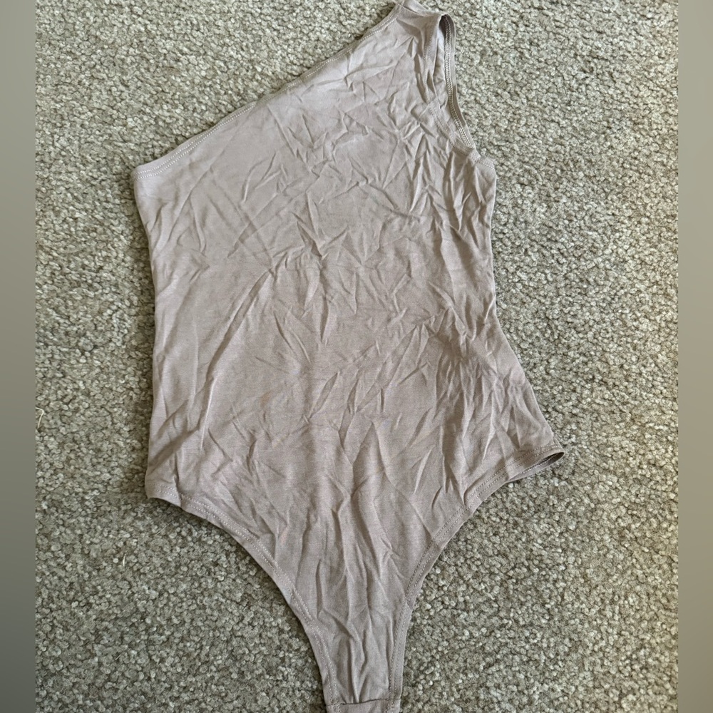 Tan one shoulder bodysuit
